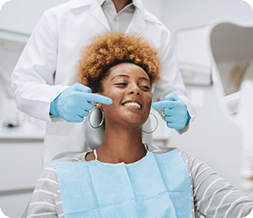 Smiling woman at dental clinic