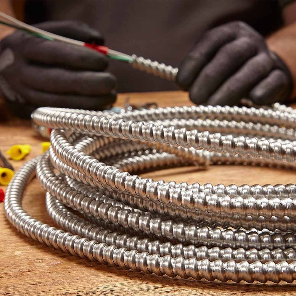 a coil of metal clad cable on a table